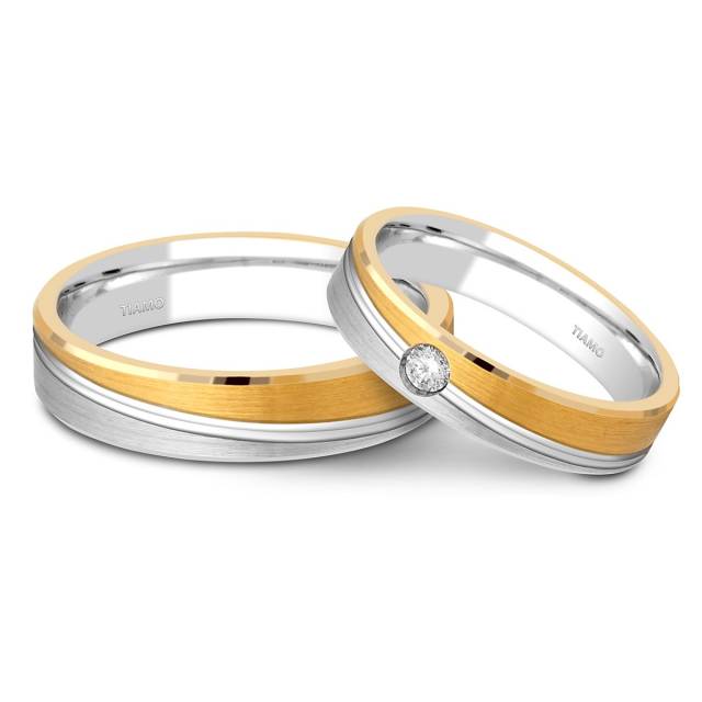 Обручальное кольцо из комбинированного золота с бриллиантом TIAMO (001298)