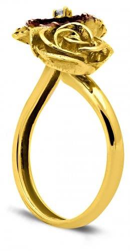 Кольцо из комбинированного золота с бриллиантом 17.0