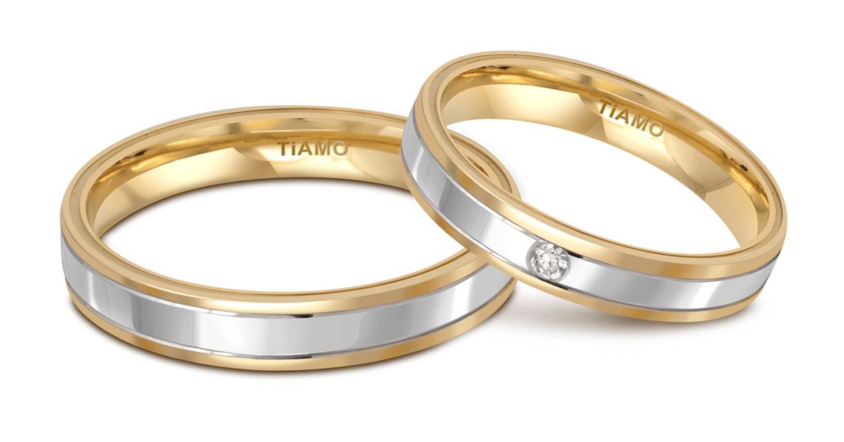 Обручальное кольцо из комбинированного золота с бриллиантом TIAMO (052878)