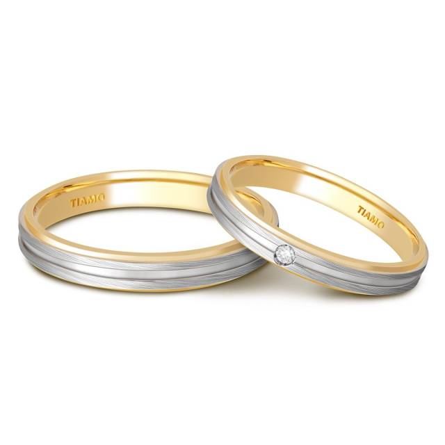 Обручальное кольцо из комбинированного золота с бриллиантом TIAMO (000048)
